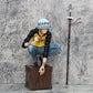 Trafalgar Law PVC Statue - One Piece Sammelfigur, kauernde Pose