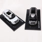 Im Angebot: Outlander SUV Modellauto (Maßstab 1:43) in Schwarz/Weiß aus Legierung